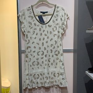 Off-white/cream dress with intricate beaded patterns. New with tags on.